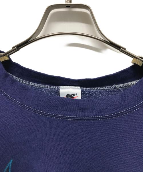 NIKE（ナイキ）NIKE (ナイキ) プリントスウェット センタースウォッシュ USA製 ネイビー サイズ:XLの古着・服飾アイテム
