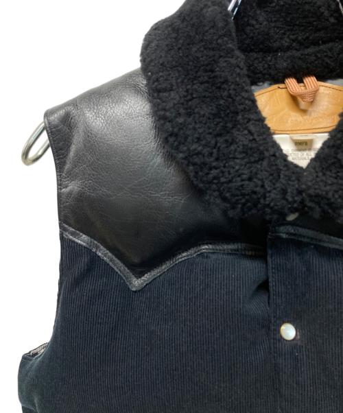 RockyMountainFeatherBed（ロッキーマウンテンフェザーベッド）RockyMountainFeatherBed (ロッキーマウンテンフェザーベッド) The DUFFER of ST.GEORGE (ザ ダファーオブセントジョージ) レザー切替コーデュロイダウンベスト ブラック サイズ:SIZE 36の古着・服飾アイテム