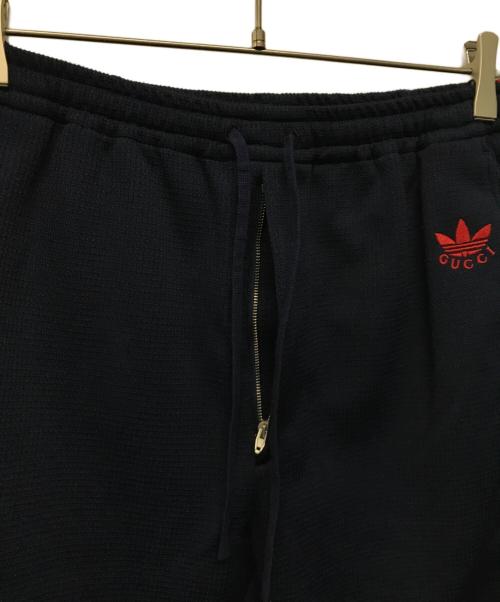 GUCCI（グッチ）GUCCI (グッチ) adidas (アディダス) ロゴ刺繍 イージートラックパンツ ネイビー サイズ:SIZE 46の古着・服飾アイテム