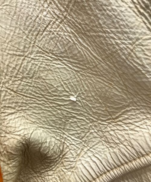 HOUSTON SPORTSWEAR（ヒューストン）HOUSTON SPORTSWEAR (ヒューストン) スタジャン オレンジ サイズ:Lの古着・服飾アイテム