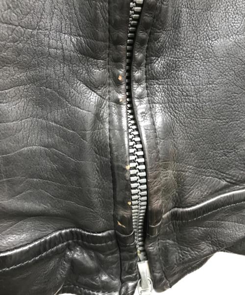 ISAMU KATAYAMA BACKLASH（イサムカタヤマ・バックラッシュ）ISAMU KATAYAMA BACKLASH (イサムカタヤマ・バックラッシュ) インドカーフタンニン製品染め シングルライダース ブラック サイズ:2の古着・服飾アイテム