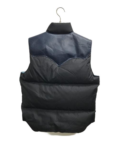 Rocky Mountain FeatherBed（ロッキーマウンテンフェザーベッド）Rocky Mountain FeatherBed (ロッキーマウンテンフェザーベッド) WAREHOUSE (ウエアハウス) WH DOWN VEST(WHダウンベスト) ブラック×ネイビー サイズ:38の古着・服飾アイテム