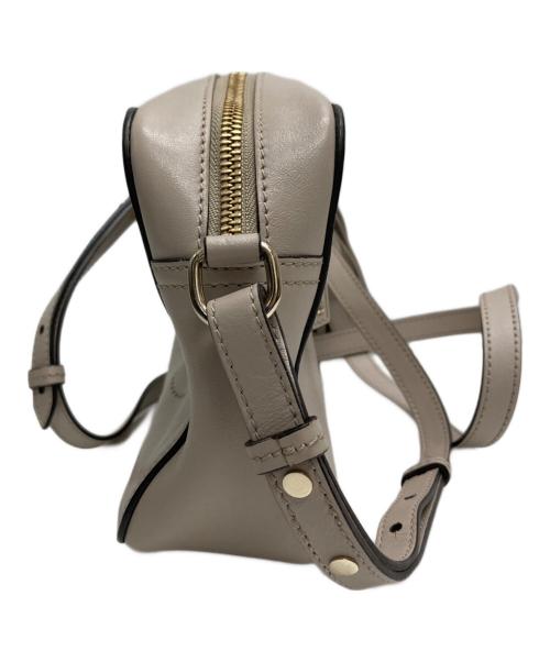 ANYA HINDMARCH（アニヤ・ハインドマーチ）ANYA HINDMARCH (アニヤハインドマーチ) スマイリークロスボディショルダーバッグ ベージュの古着・服飾アイテム