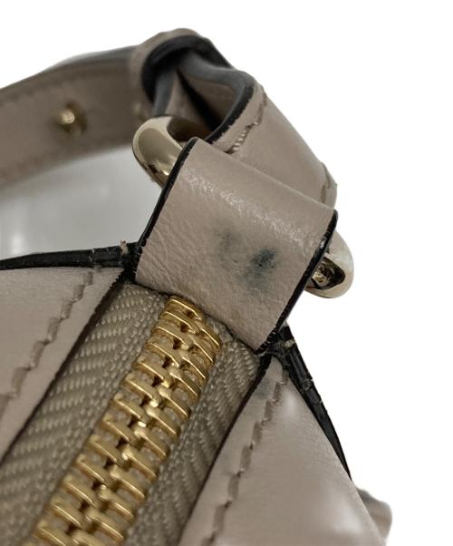 ANYA HINDMARCH（アニヤ・ハインドマーチ）ANYA HINDMARCH (アニヤハインドマーチ) スマイリークロスボディショルダーバッグ ベージュの古着・服飾アイテム