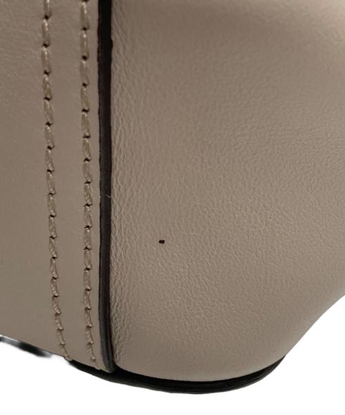 ANYA HINDMARCH（アニヤ・ハインドマーチ）ANYA HINDMARCH (アニヤハインドマーチ) スマイリークロスボディショルダーバッグ ベージュの古着・服飾アイテム