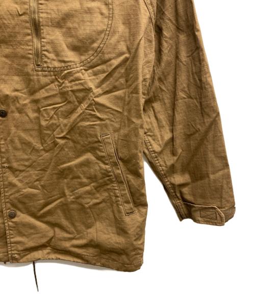 Oregonian Camper（オレゴニアンキャンパー）Oregonian Camper (オレゴニアンキャンパー) Fire Proof 焚き火コート ブラウン サイズ:XLの古着・服飾アイテム