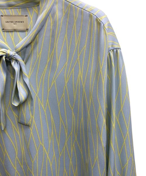 UNITED ARROWS TOKYO（ユナイテッドアローズトウキョウ）UNITED ARROWS TOKYO (ユナイテッドアローズトウキョウ) ラインプリント ボウタイブラウス ブルー サイズ:記載無しの古着・服飾アイテム