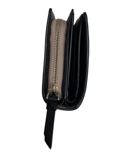 Kate Spade（ケイトスペード）Kate Spade (ケイトスペード) 2つ折り財布 ベージュ×ブラックの古着・服飾アイテム