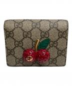 GUCCIグッチ）の古着「GGスプリーム チェリー コンパクトウォレット」｜ブラウン