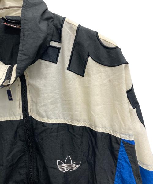 adidas（アディダス）adidas (アディダス) ナイロンジャケット ブラック×ブルー サイズ:7の古着・服飾アイテム