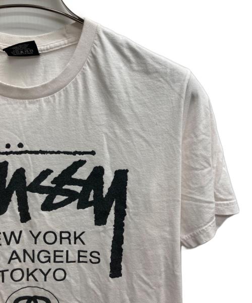 stussy（ステューシー）stussy (ステューシー) World Tour Tee ホワイト サイズ:Mの古着・服飾アイテム