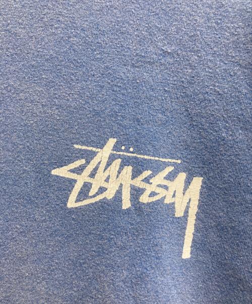stussy（ステューシー）stussy (ステューシー) FLAG MAN TEE ブルー サイズ:Mの古着・服飾アイテム
