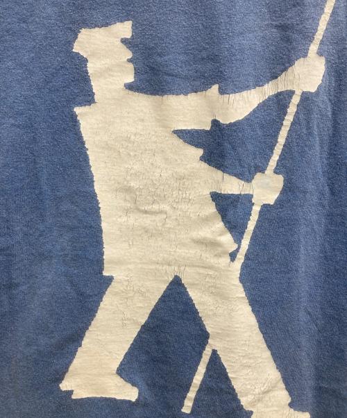 stussy（ステューシー）stussy (ステューシー) FLAG MAN TEE ブルー サイズ:Mの古着・服飾アイテム