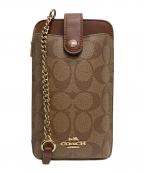 COACHコーチ）の古着「ノース／サウス フォーン クロスボディ シグネチャー キャンバス」｜ブラウン