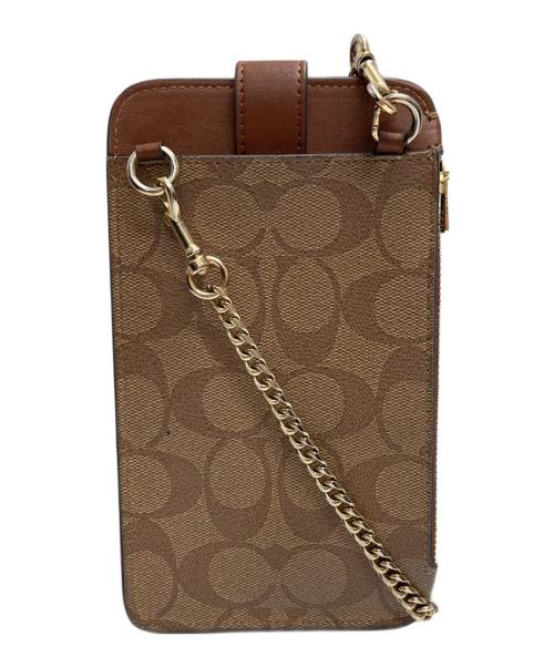 COACH（コーチ）COACH (コーチ) ノース／サウス フォーン クロスボディ シグネチャー キャンバス ブラウンの古着・服飾アイテム