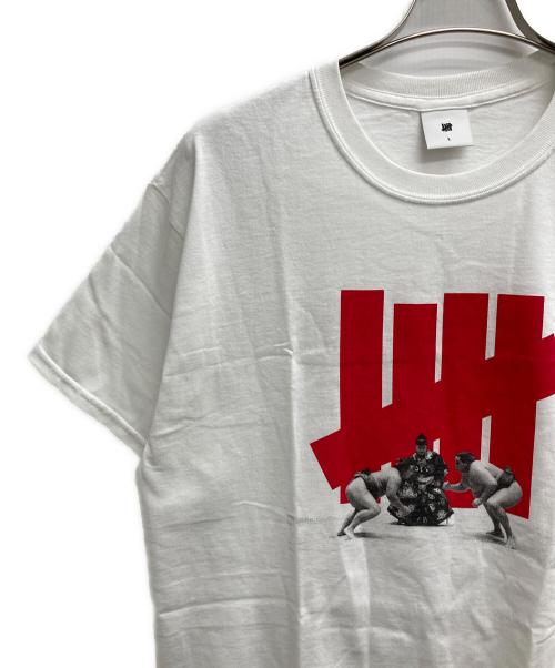 UNDEFEATED（アンディフィーテッド）UNDEFEATED (アンディフィーテッド) 相撲プリントTシャツ ホワイト サイズ:Lの古着・服飾アイテム
