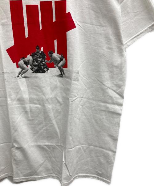 UNDEFEATED（アンディフィーテッド）UNDEFEATED (アンディフィーテッド) 相撲プリントTシャツ ホワイト サイズ:Lの古着・服飾アイテム