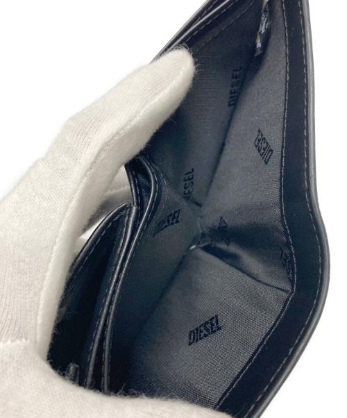 DIESEL（ディーゼル）DIESEL (ディーゼル) Leather bi-fold wallet ブラックの古着・服飾アイテム