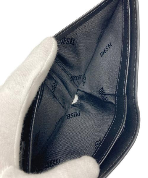 DIESEL（ディーゼル）DIESEL (ディーゼル) Leather bi-fold wallet ブラックの古着・服飾アイテム