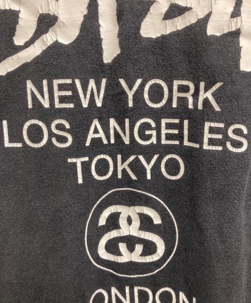 stussy（ステューシー）stussy (ステューシー) WORLD TOUR TEE ブラック サイズ:Lの古着・服飾アイテム