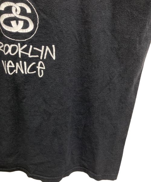 stussy（ステューシー）stussy (ステューシー) WORLD TOUR TEE ブラック サイズ:Lの古着・服飾アイテム