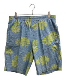 stussy（ステューシー）の古着「花柄ハーフパンツ」｜ブルー