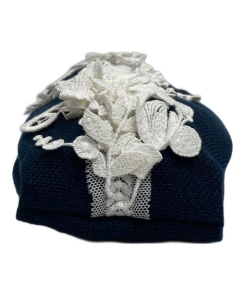 mina perhonen（ミナ ペルホネン）mina perhonen (ミナ ペルホネン) 巾着ポーチ ネイビーの古着・服飾アイテム