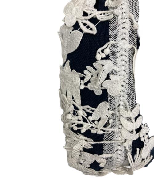 mina perhonen（ミナ ペルホネン）mina perhonen (ミナ ペルホネン) 巾着ポーチ ネイビーの古着・服飾アイテム