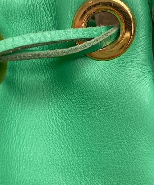 J&M DAVIDSON（ジェイ＆エム デヴィッドソン）J&M DAVIDSON (ジェイ＆エム デヴィッドソン) カーニバル フリンジ 巾着バッグ 黄緑の古着・服飾アイテム