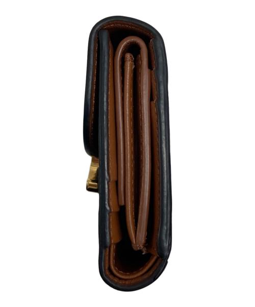CELINE（セリーヌ）CELINE (セリーヌ) スモールフラップウォレット トリオンフ タンの古着・服飾アイテム