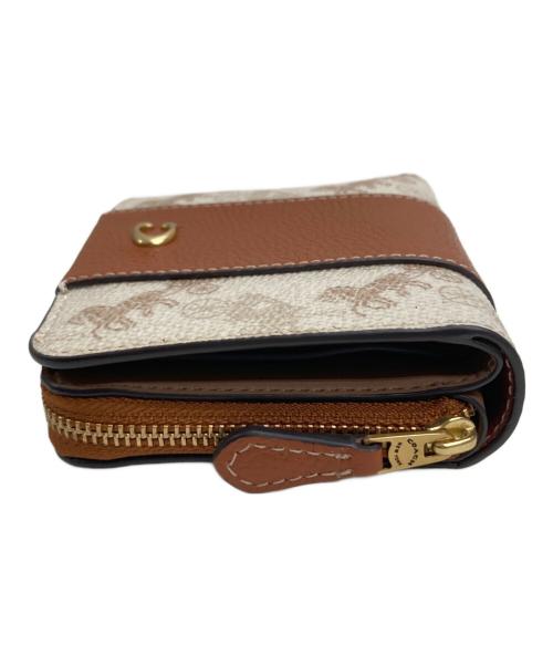 COACH（コーチ）COACH (コーチ) ビルフォールド ウォレット・ホース アンド キャリッジ プリント アイボリーの古着・服飾アイテム
