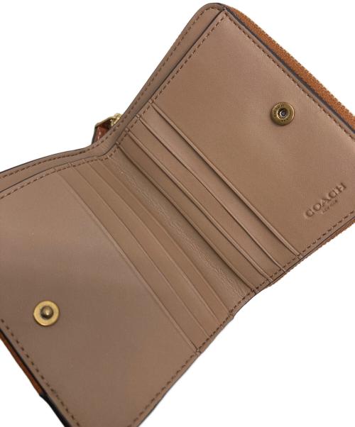 COACH（コーチ）COACH (コーチ) ビルフォールド ウォレット・ホース アンド キャリッジ プリント アイボリーの古着・服飾アイテム