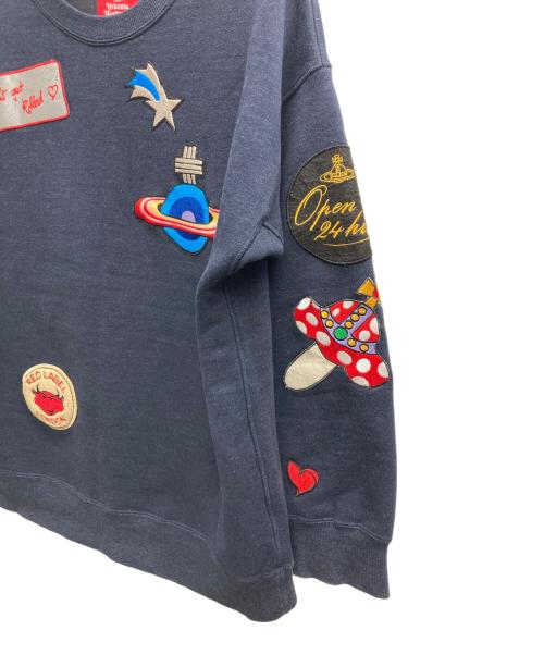 Vivienne Westwood RED LABEL（ヴィヴィアンウエストウッドレッドレーベル）Vivienne Westwood RED LABEL (ヴィヴィアンウエストウッドレッドレーベル) マルチアイコンワッペントレーナー ネイビーの古着・服飾アイテム