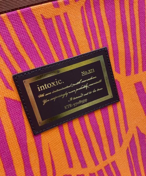 intoxic（イントキシック）intoxic (イントキシック) トートバッグ オレンジの古着・服飾アイテム