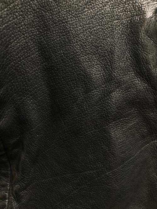 ISAMU KATAYAMA BACKLASH（イサムカタヤマ・バックラッシュ）ISAMU KATAYAMA BACKLASH (イサムカタヤマ・バックラッシュ) イタリアンバッファロー製品染めカデイン＋アロマオイル  シングルライダースジャケット ブラック サイズ:XSの古着・服飾アイテム