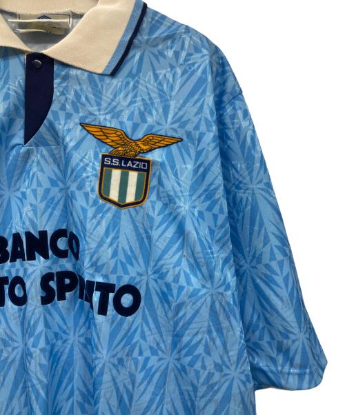 UMBRO（アンブロ）UMBRO (アンブロ) S.S. LAZIOゲームシャツ スカイブルー サイズ:Lの古着・服飾アイテム