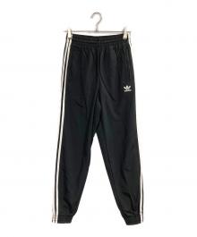adidas（アディダス）の古着「adicolor woven firebird track pants」｜ブラック