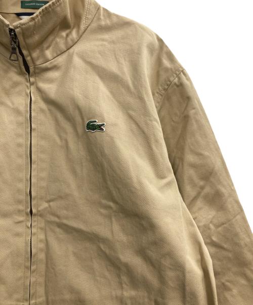 LACOSTE（ラコステ）LACOSTE (ラコステ) BEAMS (ビームス) 別注ヴィンテージバッジブルゾンジャケット ベージュ サイズ:Sの古着・服飾アイテム