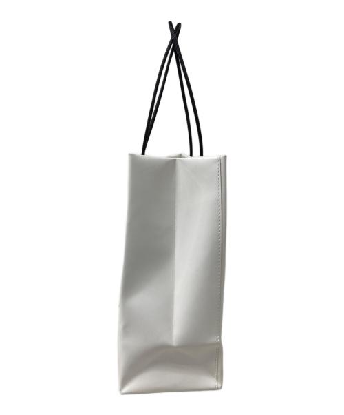UNKNOWN PRODUCTS（アンノウン プロダクツ）UNKNOWN PRODUCTS (アンノウン プロダクツ) Ken Kagami (ケンカガミ) Leather Paper Bag ホワイトの古着・服飾アイテム