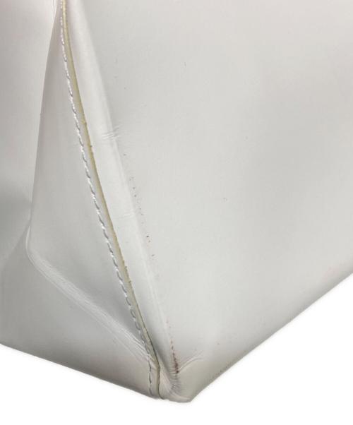 UNKNOWN PRODUCTS（アンノウン プロダクツ）UNKNOWN PRODUCTS (アンノウン プロダクツ) Ken Kagami (ケンカガミ) Leather Paper Bag ホワイトの古着・服飾アイテム
