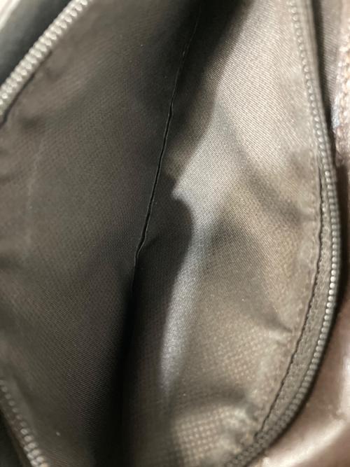 TUMI（トゥミ）TUMI (トゥミ) 二つ折長財布 ブラウンの古着・服飾アイテム