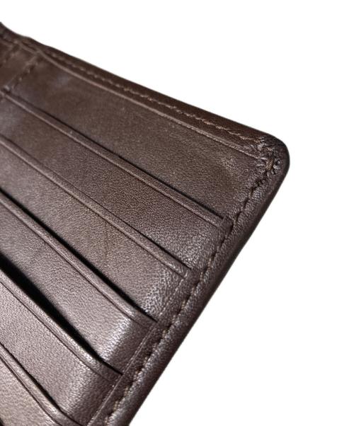 TUMI（トゥミ）TUMI (トゥミ) 二つ折長財布 ブラウンの古着・服飾アイテム