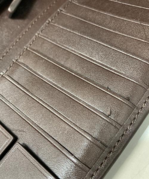 TUMI（トゥミ）TUMI (トゥミ) 二つ折長財布 ブラウンの古着・服飾アイテム