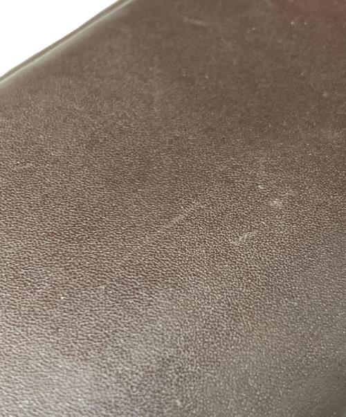 TUMI（トゥミ）TUMI (トゥミ) 二つ折長財布 ブラウンの古着・服飾アイテム