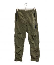 STONE ISLAND（ストーンアイランド）の古着「Nylon metal pants」｜オリーブ