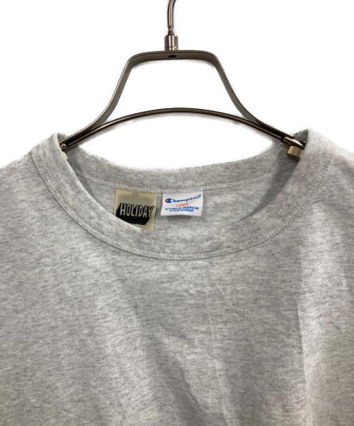 Champion（チャンピオン）Champion (チャンピオン) holiday (ホリデー) プリントTシャツ グレー サイズ:FREEの古着・服飾アイテム