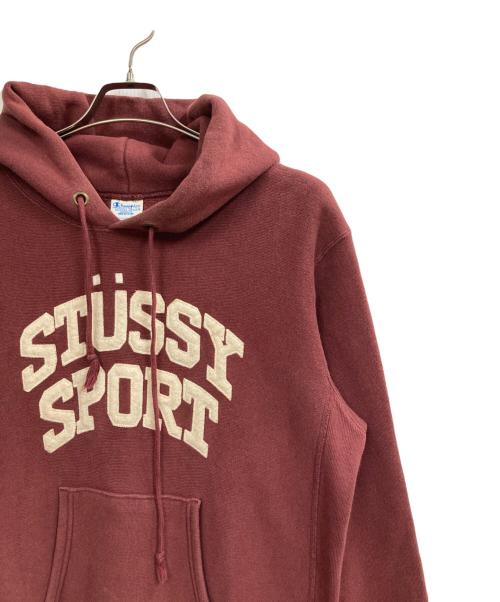 stussy（ステューシー）stussy (ステューシー) Champion (チャンピオン) アーチロゴパーカー レッド サイズ:Mの古着・服飾アイテム