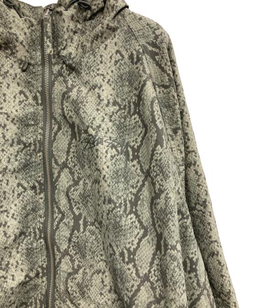 stussy（ステューシー）stussy (ステューシー) BEACH SHELL SNAKE PRINT NYLON JACKET オリーブ サイズ:Lの古着・服飾アイテム