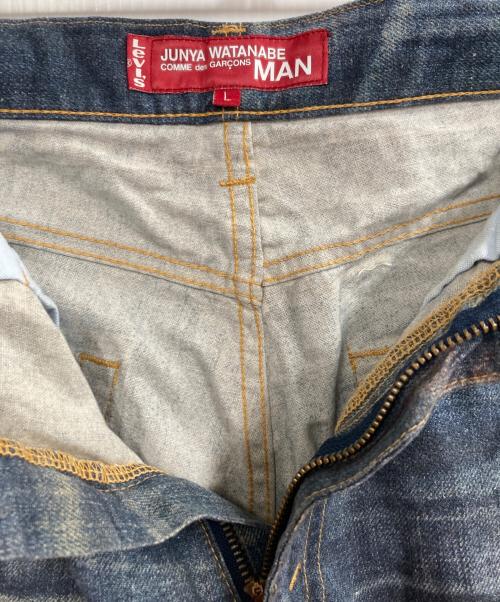 JUNYA WATANABE COMME des GARCONS（(ジュンヤワタナベ コムデギャルソン）JUNYA WATANABE COMME des GARCONS ((ジュンヤワタナベ コムデギャルソン) LEVI'S (リーバイス) コットンリネン 転写パンツ インディゴ サイズ:Lの古着・服飾アイテム