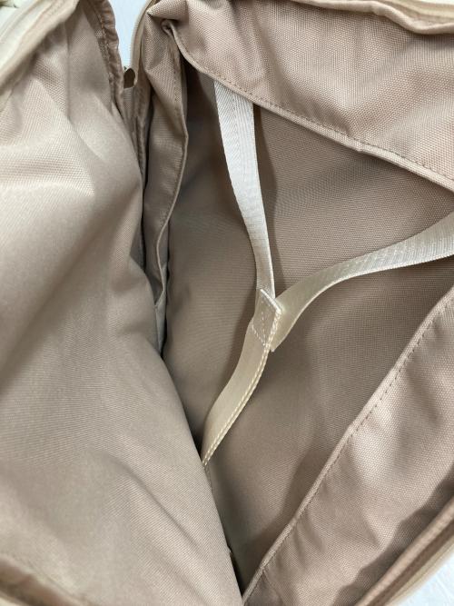 AWW（アウ）Aww (アウ) 圧縮トラベルバックパック アイボリーの古着・服飾アイテム